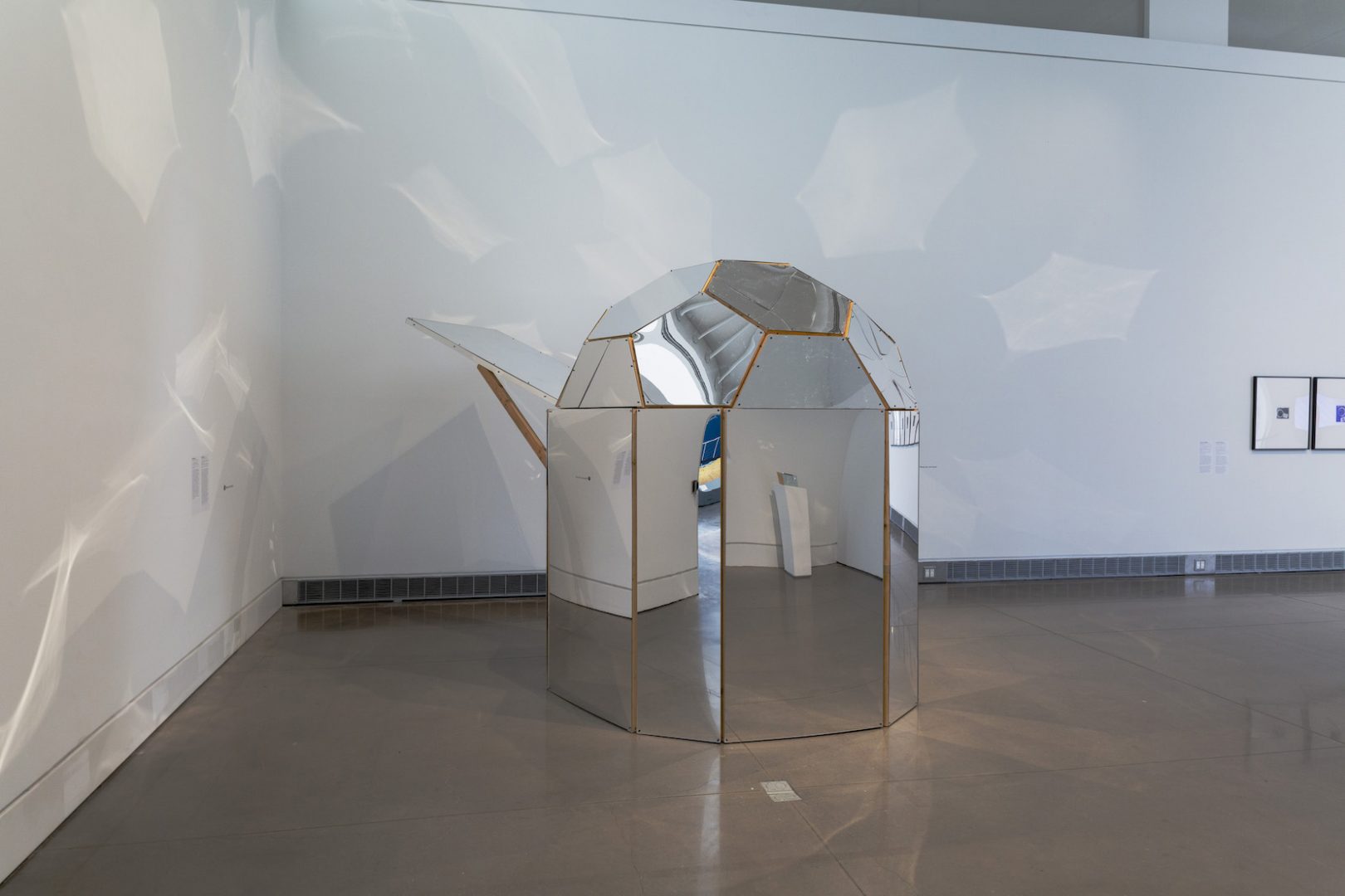 BEATRIZ CORTEZ 7 Beatriz Cortez, The Cosmos (Spaceship), 2015. Wood, acrylic mirror, sound installation. Installation view at the Queens Museum, New York. Courtesy of the artist and Commonwealth and Council. Photo: Hai Zhang.